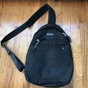 Tumi black slinger backpack single strap NWOT